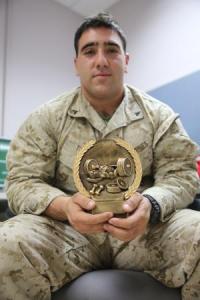 Lance Cpl. Eddie Toma, an administrative clerk serving with 3rd Battalion, 7th Marine Regiment, won first place in Camp Leatherneck's 1000 pound powerlifting competition. 